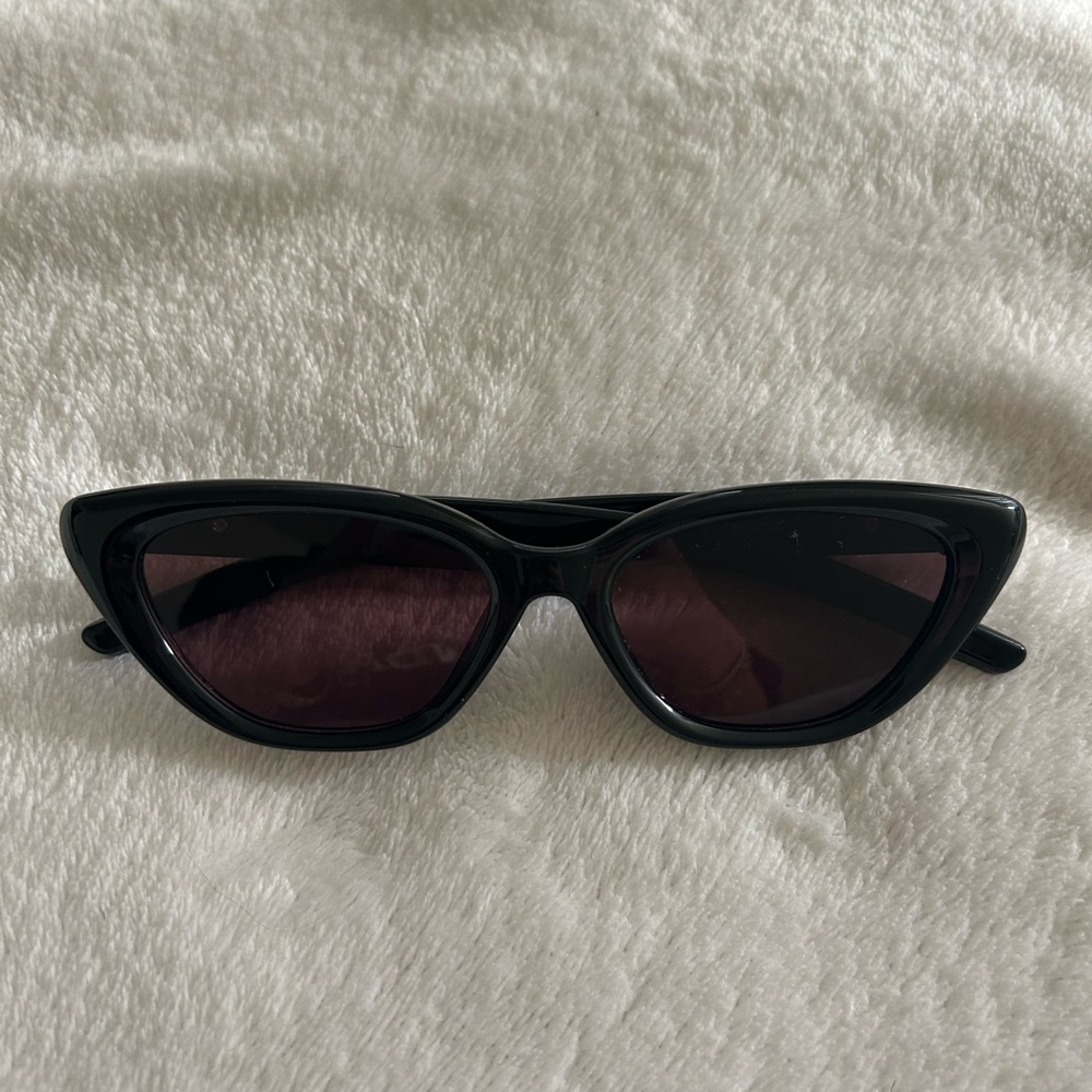 gentle monster glasses cat eye shape brown lenses